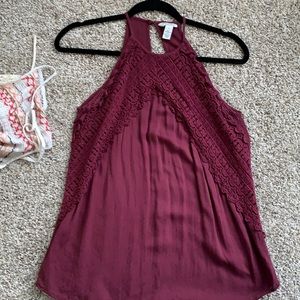 fits like a medium/Small. Longish top.